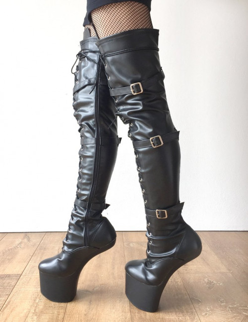 Black leather horse boots